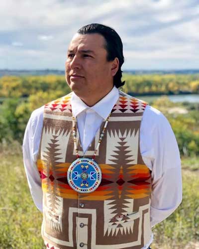 Sustainability In Your Ear: Cody Two Bears on Indigenized Energy’s Community-Centric Grid Strategy