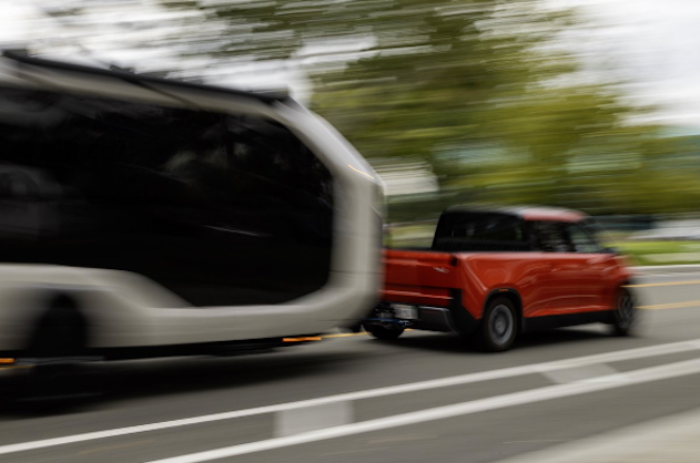 Pebble Flow electric RV towed by TELO’s MINI-sized electric truck