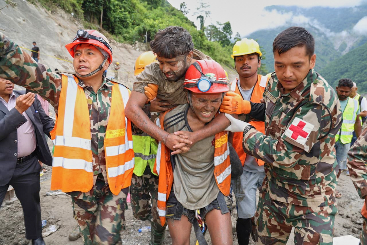 Rescuers pull 2 trapped workers from a hydropower tunnel 9 days after Nepal floods